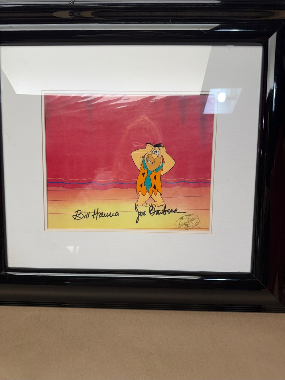 Authentic Framed Cartoon Wall Art in Red and Orange Featuring Classic Character